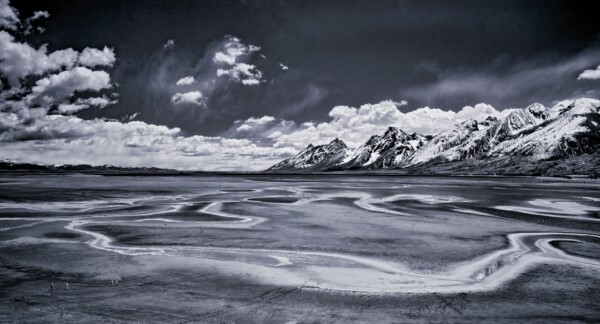 By Michael Piraino Grand Tetons panorama with braided Snake River in black and white
