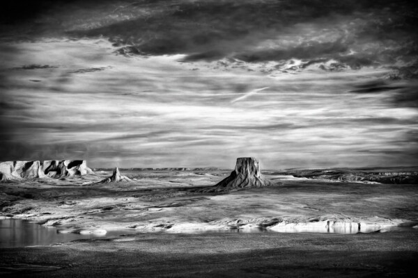 By Michael Piraino Distant view of Tower Butte in the desert on the Navajo Nation in black and white
