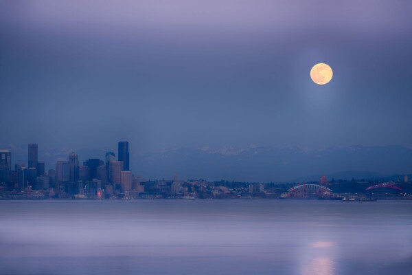 By Michael Piraino Moonrise over Seattle skyline and Puget Sound