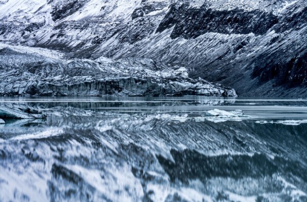 By Michael Piraino Glacier ice reflections in New Zealand Lake