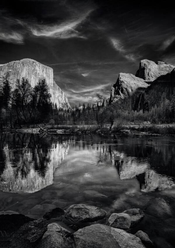By Michael Piraino Yosemite Valley Yosemite National Park with mountain reflections in Merced River in black and white