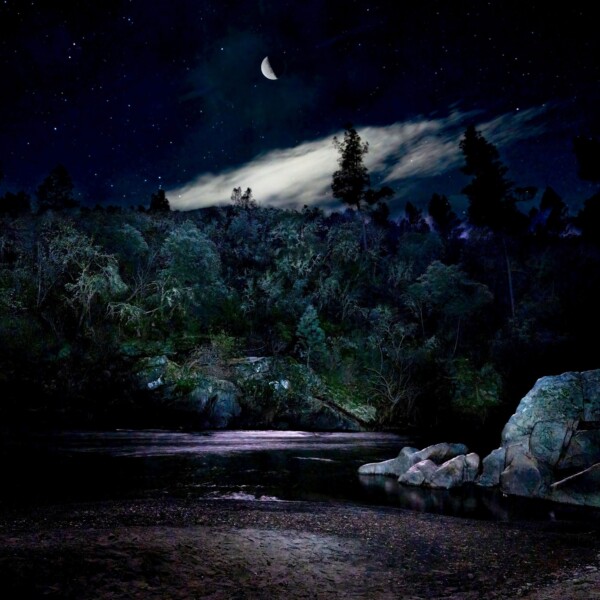 By Michael Piraino moon and cloud over Merced River at night