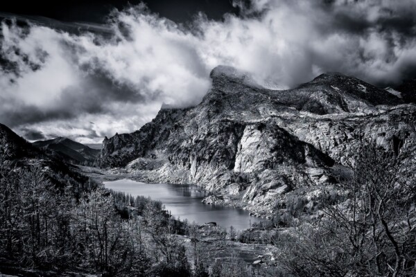 By Michael Piraino Mountains, clouds and an alpine lake in the Enchantment Lakes, North Cascades, in black and white