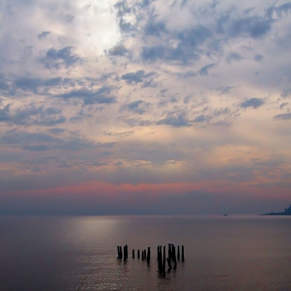 By Michael Piraino Ocean with clouds and sunrise sky