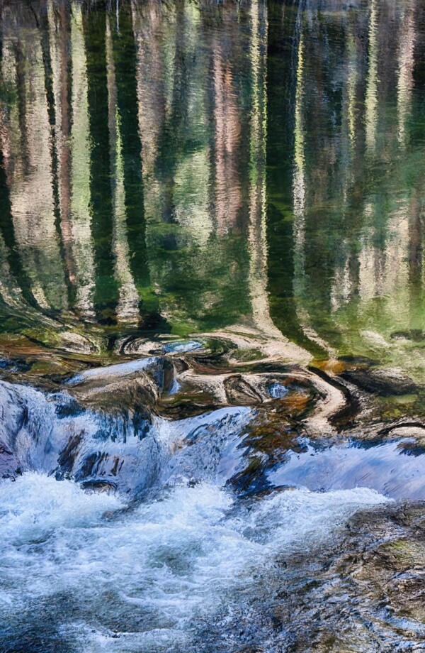 By Michael Piraino green and gold reflections in Merced River, Yosemite National Park