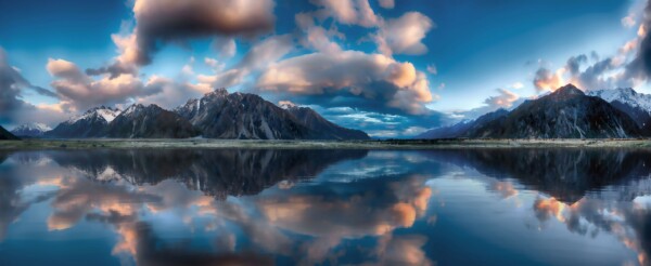 By Michael Piraino Panorama Southern Alps reflected in lake