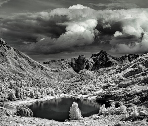 By Michael Piraino High Sierra Rae Lake 60 Lakes Basin storm clouds alpine lake in black and white