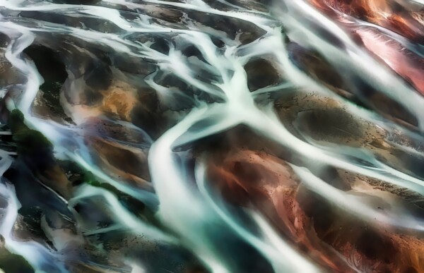 By Carin Piraino Abstract of braided river in New Zealand