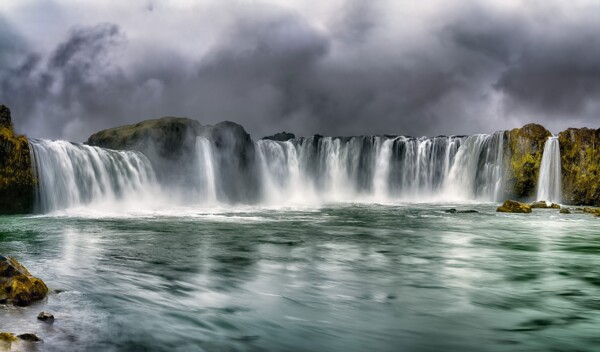 By Michael Piraino godafoss waterfall northern Iceland with storm clouds