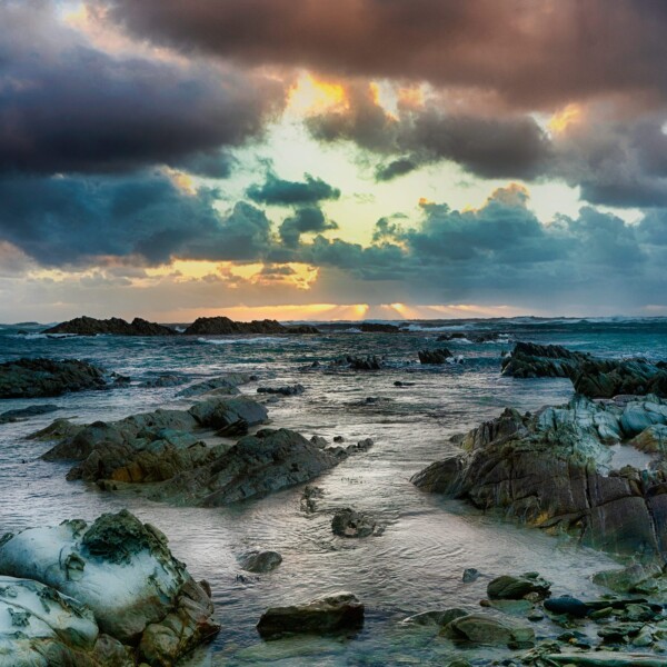 By Michael Piraino Sunset and rocky shoreline, Southern Ocean, Tasmania