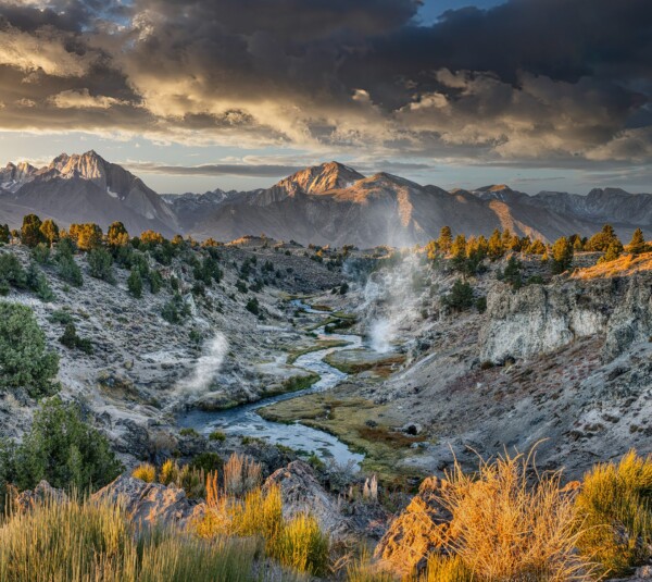 By Michael Piraino Steam in geothermal area at sunrise